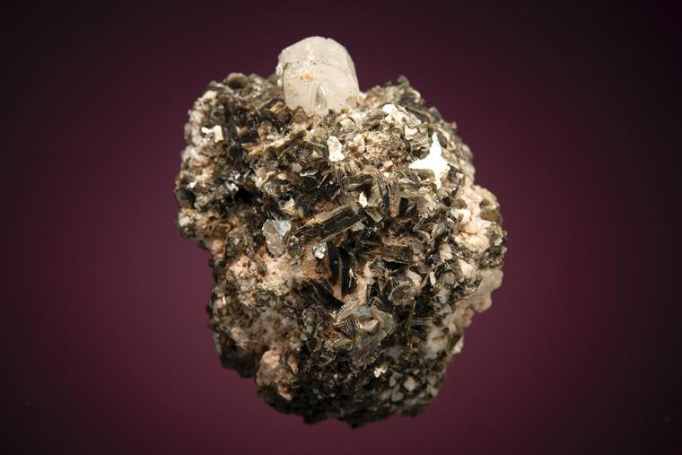 PHENAKITE on MUSCOVITE