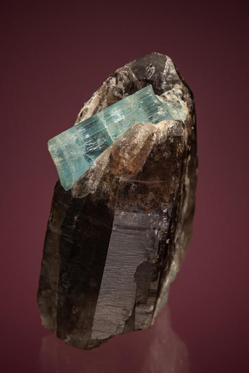 BERYL var. Aquamarine on QUARTZ var. Smoky