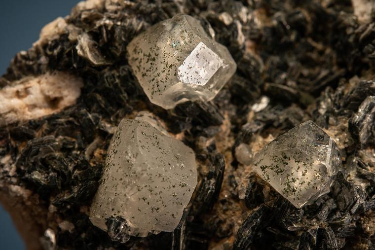 PHENAKITE on MUSCOVITE