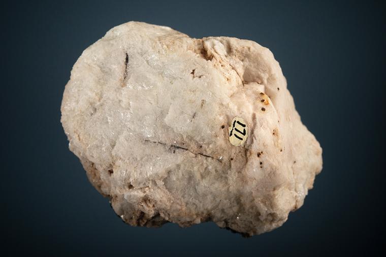 PHENAKITE on MUSCOVITE