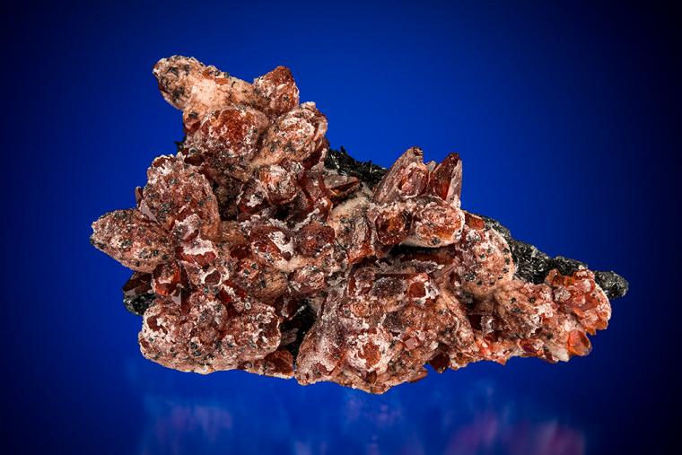 RHODOCHROSITE with QUARTZ on MANGANITE