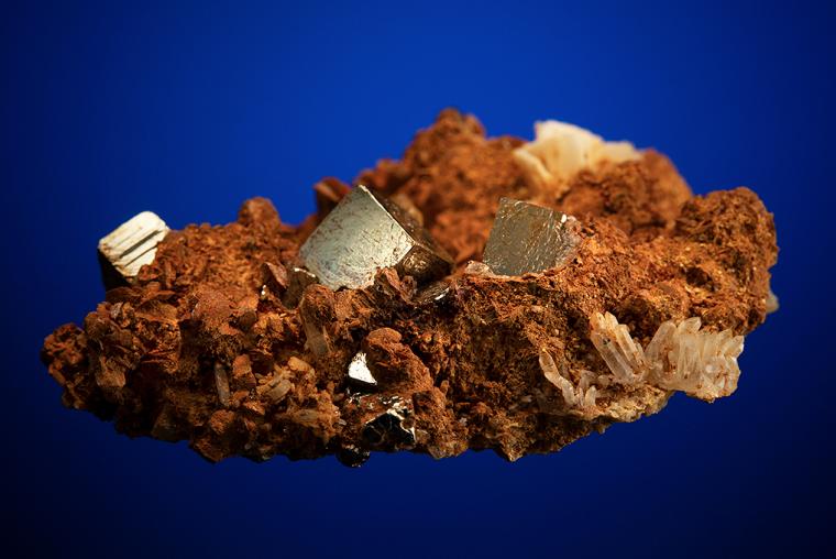 PYRITE with BARITE on SIDERITE and QUARTZ