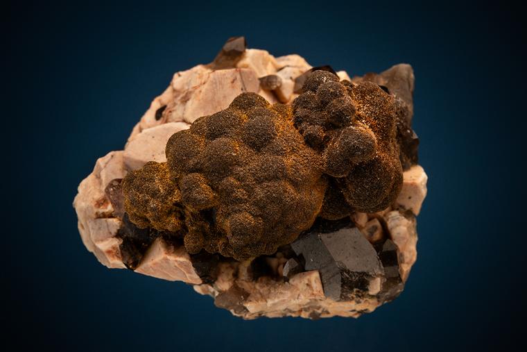 GOETHITE on QUARTZ on MICROCLINE