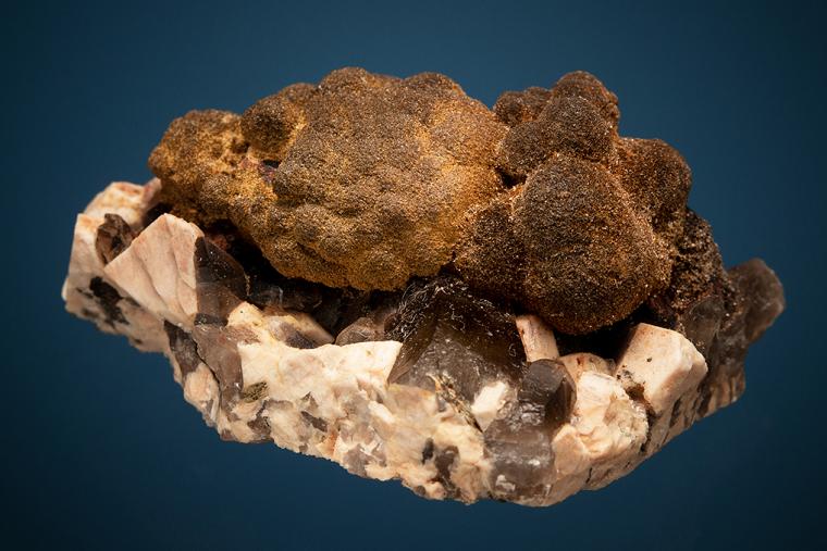 GOETHITE on QUARTZ on MICROCLINE