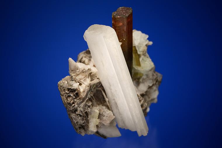 HAMBERGITE with ELBAITE (repaired)