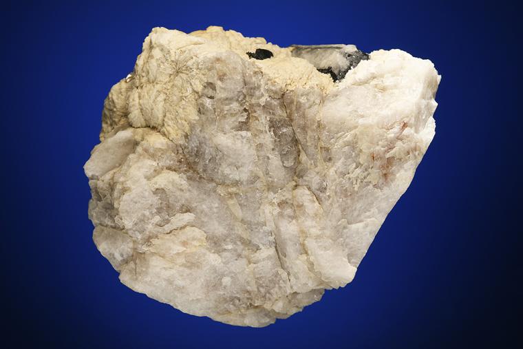 QUARTZ after Tourmaline with SPESSARTINE