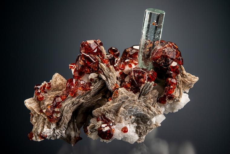 BERYL var. Aquamarine with SPESSARTINE on MUSCOVITE