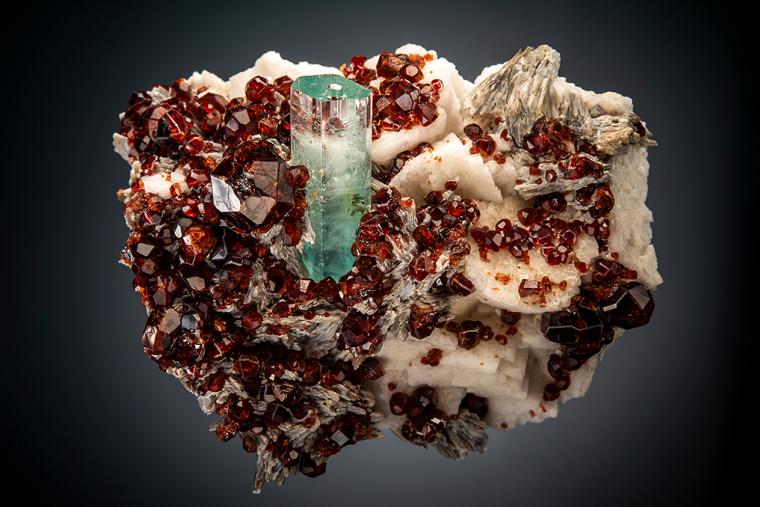 BERYL var. Aquamarine with SPESSARTINE on MICROCLINE and MUSCOVITE