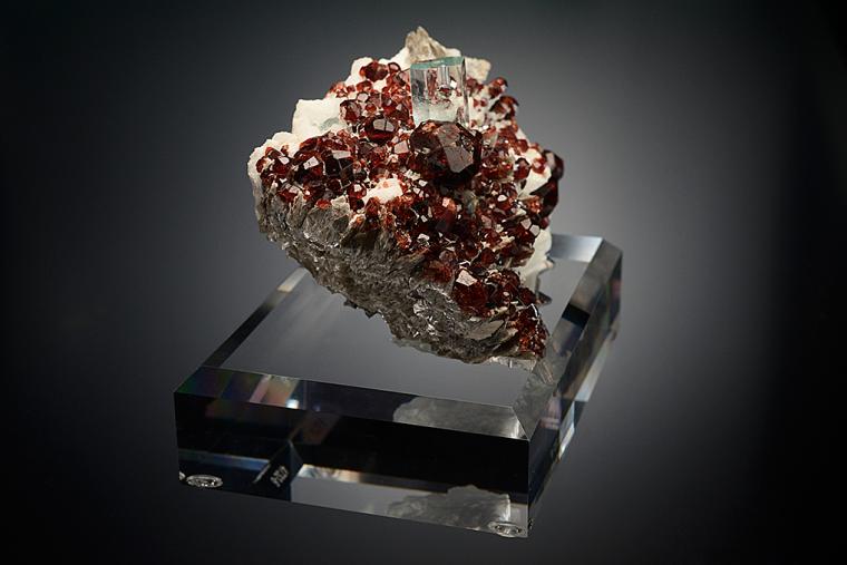 BERYL var. Aquamarine with SPESSARTINE on MICROCLINE and MUSCOVITE