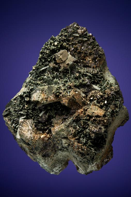 PYRITE with MAGNETITE on ACTINOLITE after DIOPSIDE 