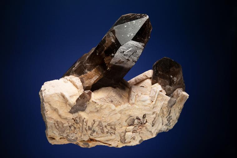 QUARTZ var. Smoky on MICROCLINE