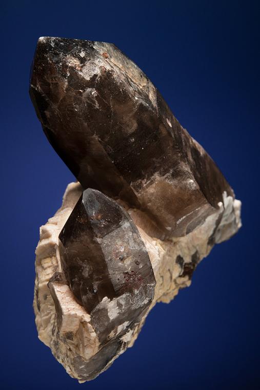QUARTZ var. Smoky on MICROCLINE