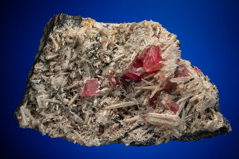 RHODOCHROSITE with HÜBNERITE and QUARTZ