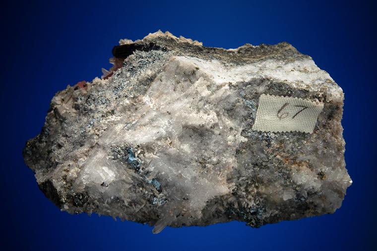 RHODOCHROSITE with HÜBNERITE and QUARTZ