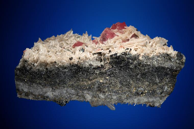 RHODOCHROSITE with HÜBNERITE and QUARTZ