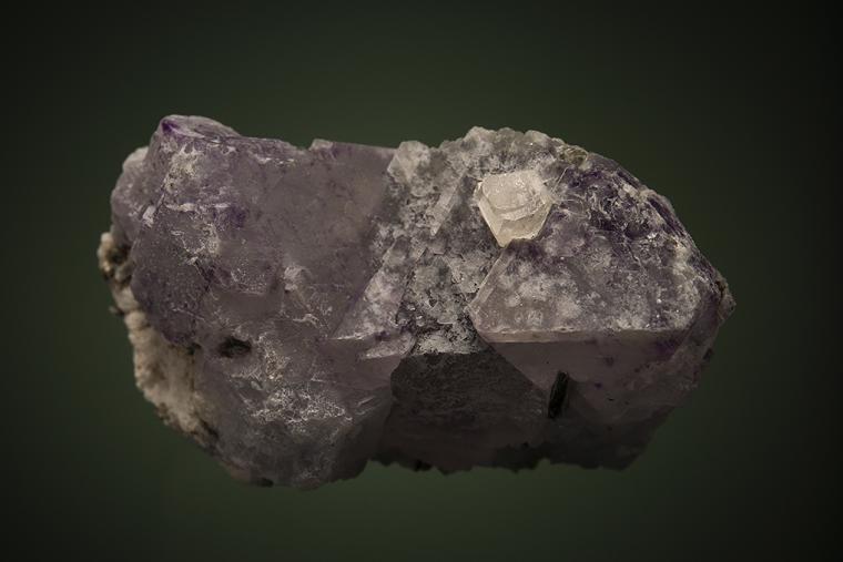 PHENAKITE on FLUORITE